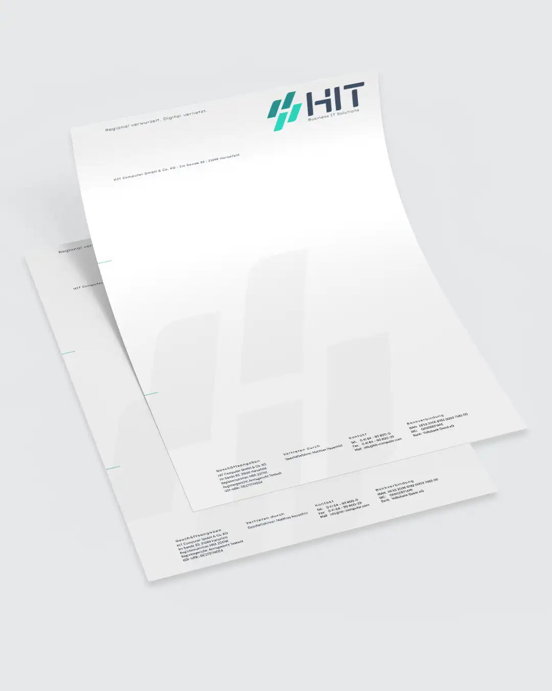 Mockup des neu gestalteten Briefpapiers der HIT Computer GmbH & Co. KG mit modernem Logo, klarer Typografie und reduziertem Corporate Design.